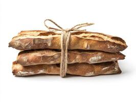 Freshly baked bread loaves tied with string, showcasing artisan craftsmanship and rustic appeal photo