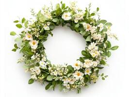 Beautiful floral wreath made of greenery and white flowers for home decoration and events photo