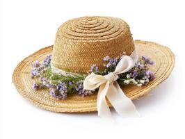 Delicate straw hat adorned with colorful flowers and a soft ribbon for a summer event or outdoor gathering photo