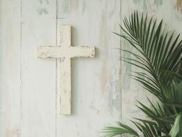 Cross and palm leave decor in a serene indoor setting with a soft color palette and rustic wooden wall design photo