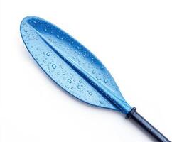 Bright blue kayak paddle with droplets of water resting on the blade against a white background photo