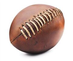 Leather football resting on a white surface highlighting its vintage design and texture photo