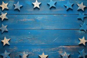 Rustic blue wooden plank background bordered by weathered star decoration frame for patriotic or festive themes photo