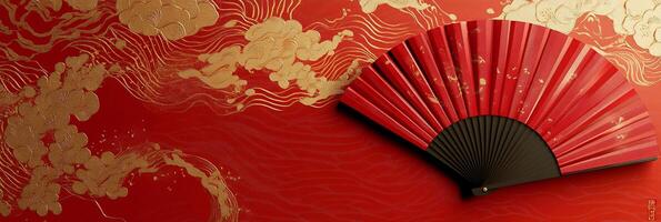Traditional flat design of floral patterned red and gold fan set on a red backdrop photo