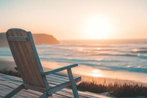 Wooden deck chair facing serene ocean waves at golden hour relaxing coastal scenery and beach tranquility photo