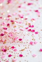 Bright and playful background features scattered pink and gold confetti on a pristine white surface. Ideal for celebrations, events, and invitations, this design offers ample space for text photo