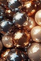 An engaging abstract backdrop showcases a lively pattern of metallic disco balls in silver, gold, and rose gold, set against a dark background, perfect for text placement photo