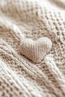 Set in light beige tones, this cozy Valentine's background features a soft knitted texture accompanied by a small heart accent. It creates a warm space perfect for heartfelt messages and designs photo