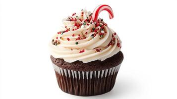 Christmas cupcake adorned with a festive candy cane photo