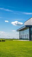 Modern Commercial Building with Lush Green Lawn photo