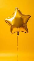 A Shiny Gold Star Balloon on a Vibrant Yellow Background photo