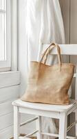 Beige Linen Tote Bag on a White Chair photo