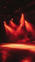 Red Stage Lights Illuminating the Performance Venue photo