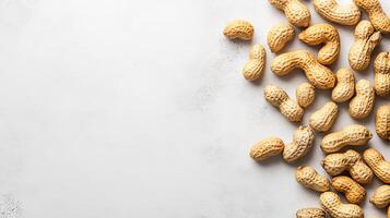 Golden Peanuts on a Light Background - A Nutritious Snack photo