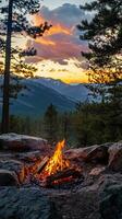 The majestic mountain campfire during sunset photo