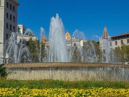 A large fountain in the middle of a field photo