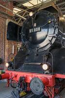 A black and red steam trasin photo