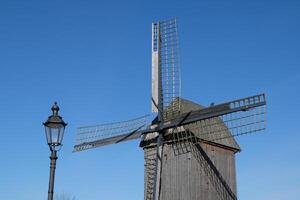 A wooden windmill in westphalia photo