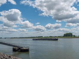 A cloudy blue sky at the rhine photo