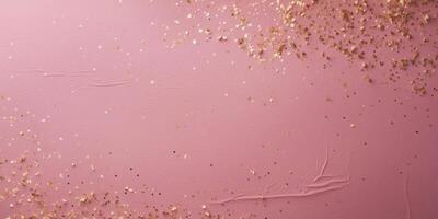 Pink background adorned with gold confettiPink background adorned with gold confetti. photo
