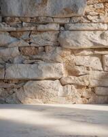 Rugged stone wall background in shades of gray beige and brown photo
