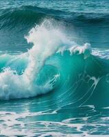 Turquoise Ocean Wave Crashing with White Foam and Blue WaterTurquoise Ocean Wave Crashing with White Foam and Blue Water. photo