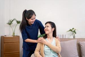 Warm caregiver engaging with elderly client, fostering connection and emotional support in a relaxed home environment photo