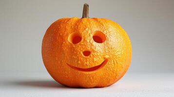 A playful pumpkin with a smiling face radiates joy for the season photo