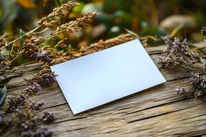 Rustic Autumn Invitation Card Mockup with Lavender and Dry Grass on Wooden Surface photo
