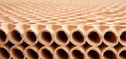 Close up of honeycomb cardboard showcasing its unique structure and texture, ideal for sustainable packaging solutions. This material is lightweight yet strong, perfect for various applications photo