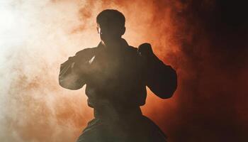 silhouette of martial artist in smoky environment, showcasing strength and determination. dramatic lighting enhances intensity of scene photo