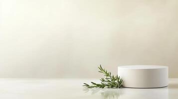 Simple white pedestal with a green sprig against a soft neutral background in a minimalist setting photo