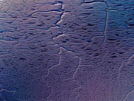 Rough texture with a pattern forming a background with copy space photo