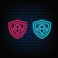 Shield-shaped emblem with circuit-shaped patterns, shining in various colors. technological protection or digital security. neon. vector