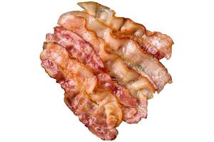 Delicious bacon in the form of slices with salt and spices and herbs photo
