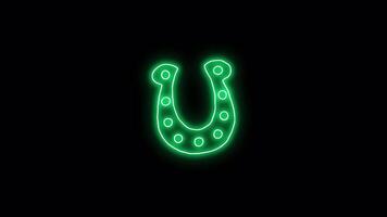 Neon sticker of green horseshoe. Alpha channel transparency. Happy St. Patricks day video