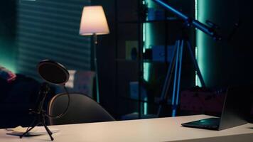 Cheerful girl arriving in studio, filming herself discussing topics of interest for generation Z fanbase. Upbeat media star entering home studio, recording targeting gen Z viewers, camera A video