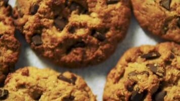 Top view of cookies on gray cement background. Cookies with chocolate HD . video