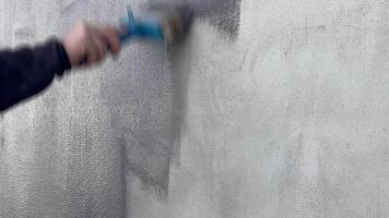 View a captivating blend of gray and white fabric textures created during an artistic process in a studio. The work highlights subtle variations and depth video