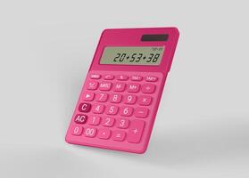 pink calculator with numbers on white backdrop photo