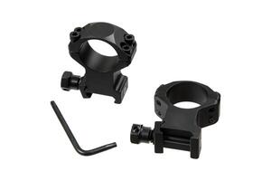 A pair of black scope rings with an Allen wrench, used for mounting a scope onto a firearm. photo