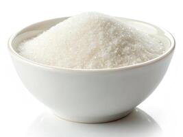 bowl filled with white granulated sugar, perfect for baking photo