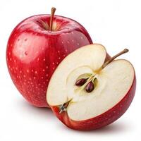 glossy red apple with shiny surface and fresh cut revealing seeds photo