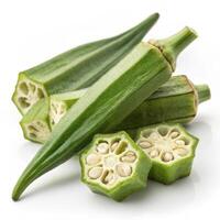 Fresh green okra, sliced and whole, showcasing its unique texture and color photo