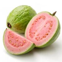 Fresh green guava sliced open, revealing its pink interior and seeds photo