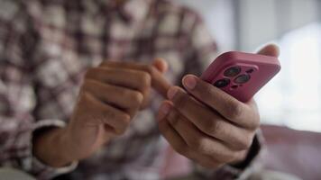 Close-Up of Hands Playing Mobile Game video