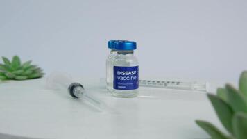 Disease Vaccine Syringe and Vials on a Table video