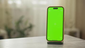 Orbiting Shot of Smartphone with Green Screen and Copy Space video