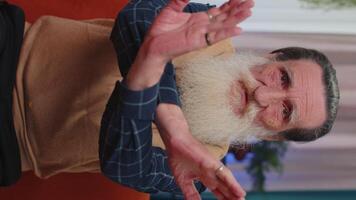 Angry old man say No hold palm folded crossed hands, warning of finish, Stop gesture, declining talk video