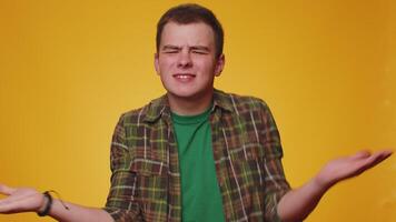Displeased man gesturing hands with irritation, displeasure, blaming scolding for failure asking why video